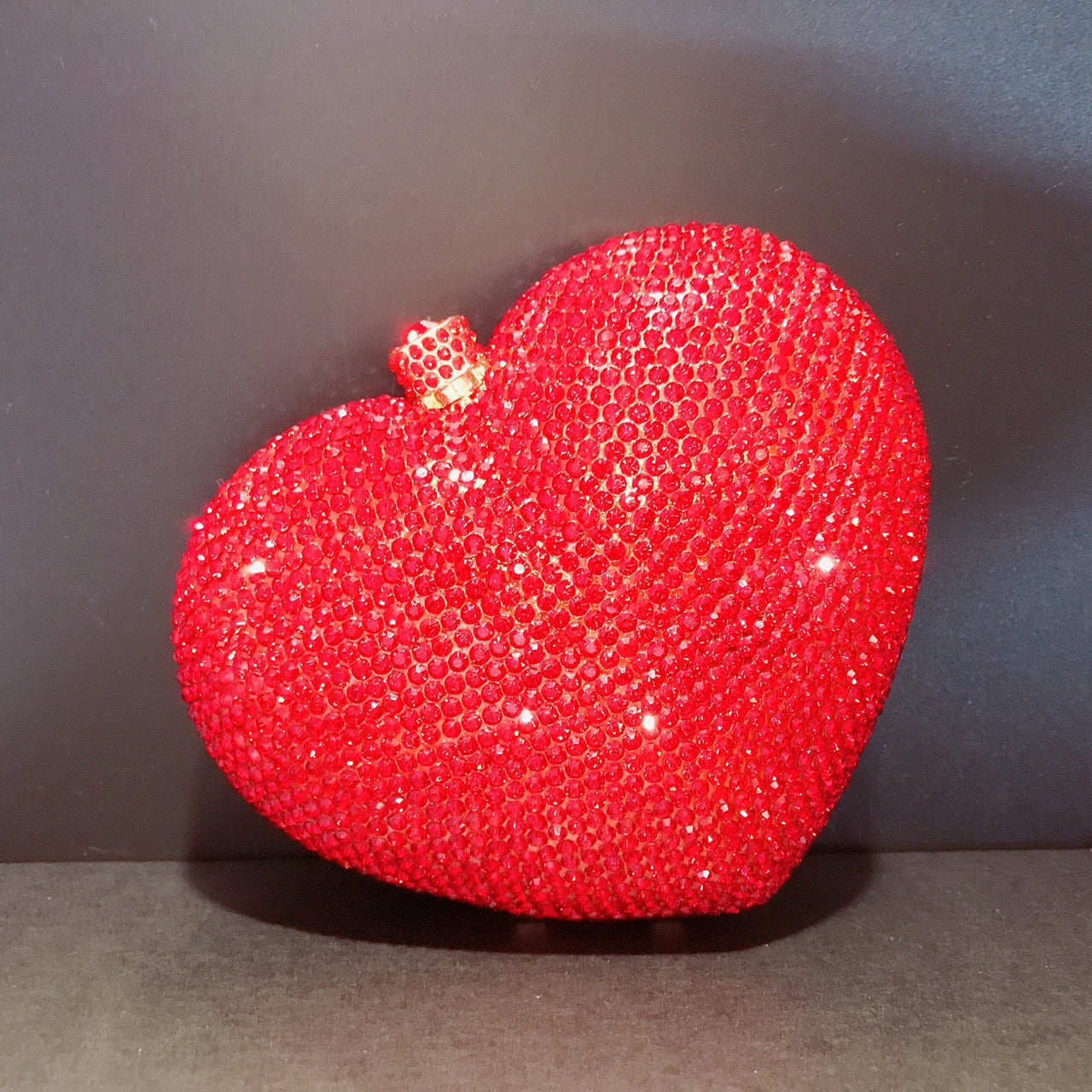 Hand Holding Heart-shaped Diamond Dinner Bag